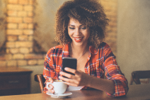 women looking at smartphone